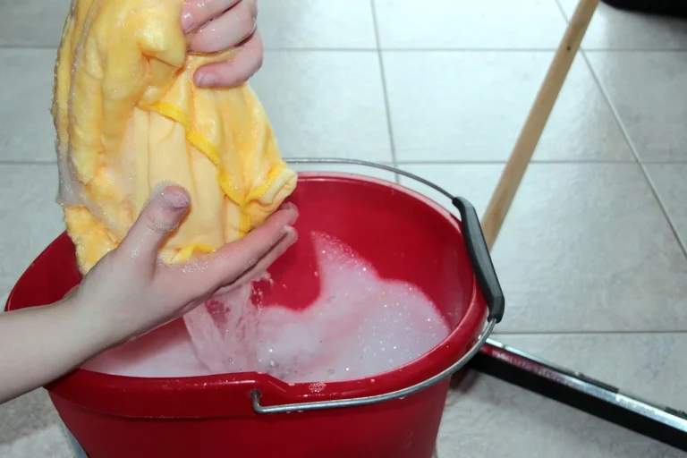 Paint Scraper Cleaning Wall