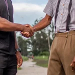 Warranty Card Handshake Deal