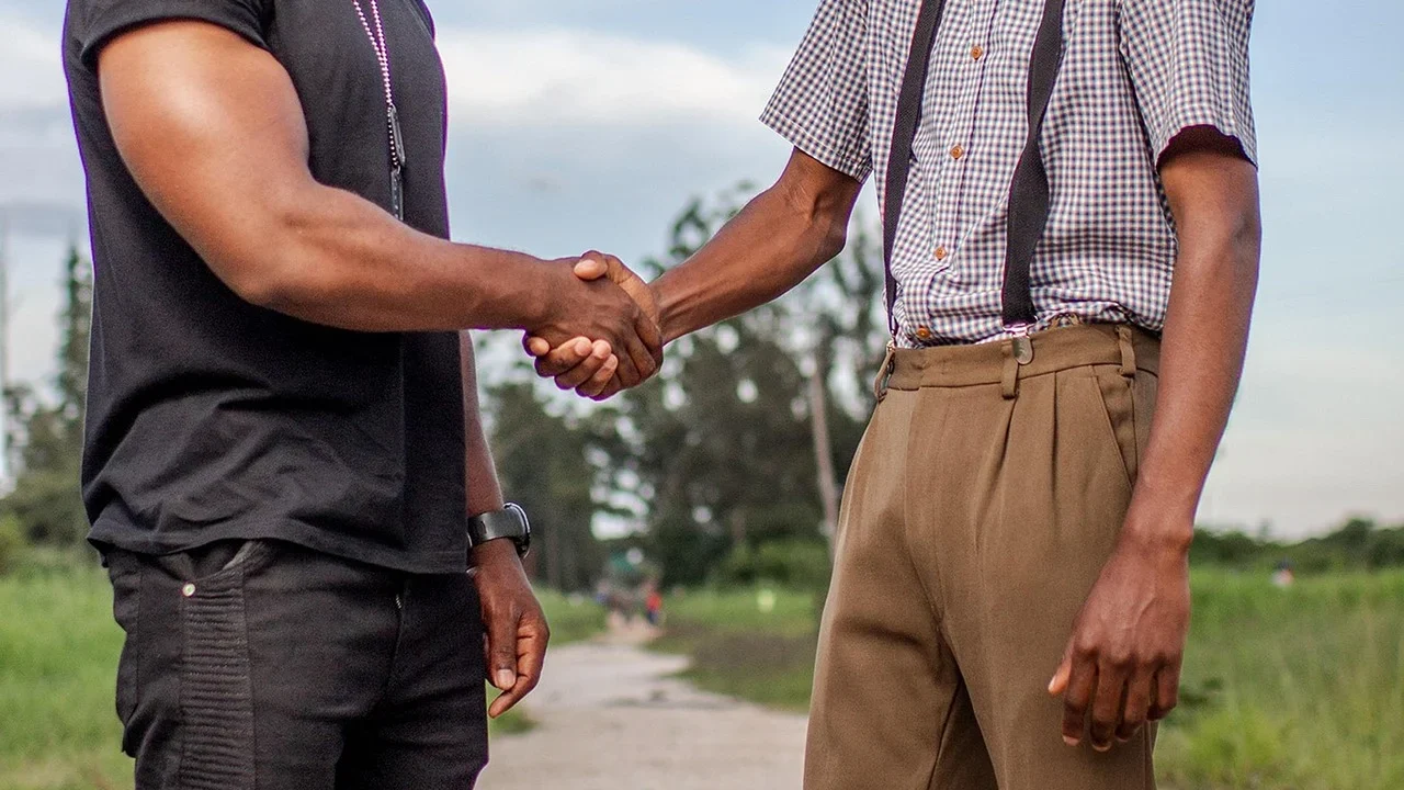 Warranty Card Handshake Deal