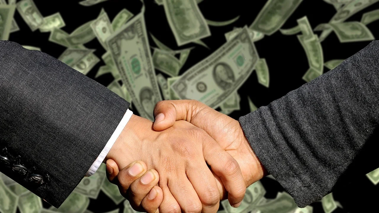 Construction Worker Handshake Deal