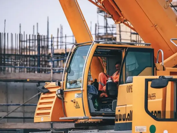 Construction Workers Installing Panels